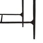 Black metal bed frame on a white background