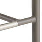 Close-up of a metal chair frame with a white background