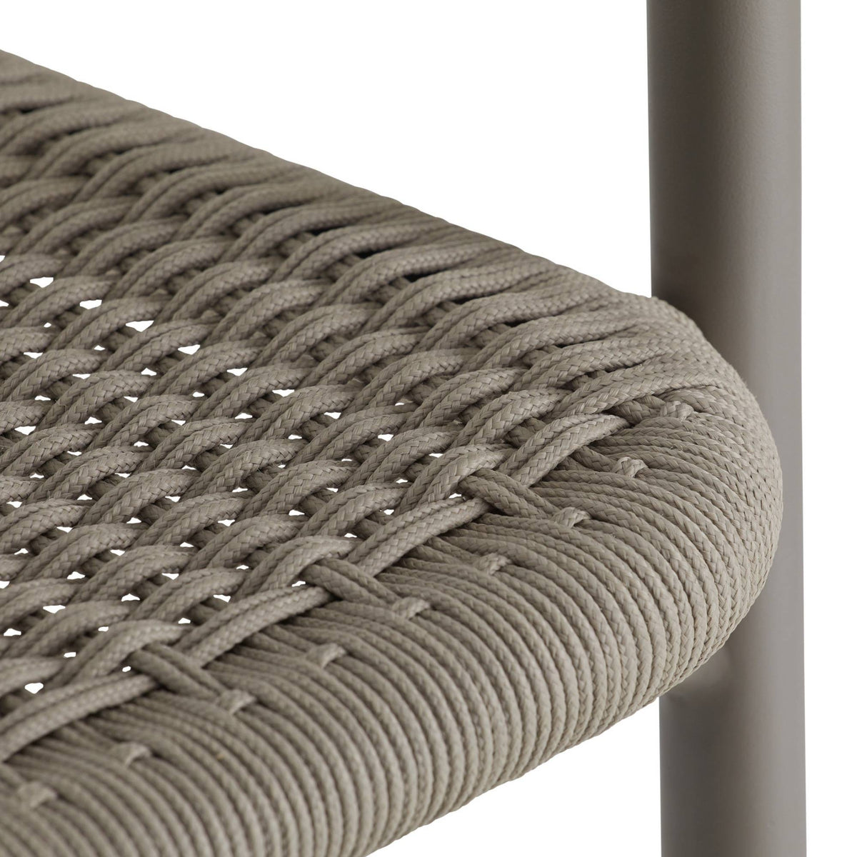 Close-up of a woven chair seat with a metal frame on a white background