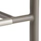 Close-up of a metallic chair frame on a white background