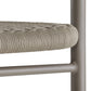 Close-up of a chair with woven seat and metal frame on a white background