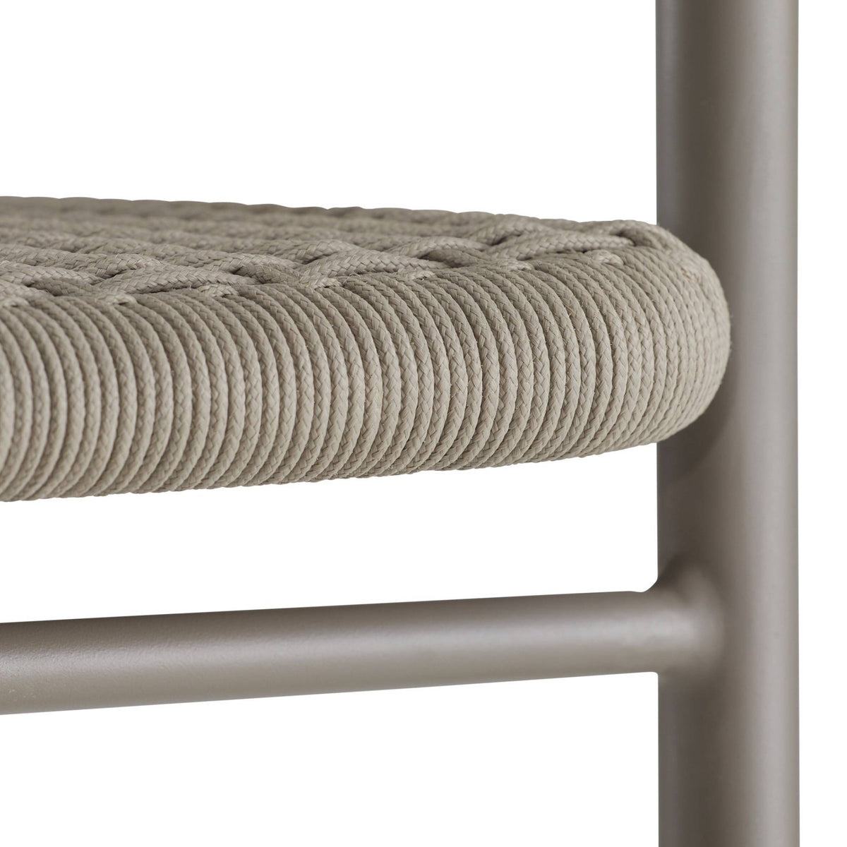 Close-up of a chair with woven seat and metal frame on a white background