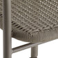 Close-up of a woven rope chair seat in a taupe-gray color with a matching metal frame, showing the texture of the rope and the metal legs against a white background.