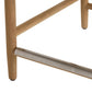 Close-up of a wooden shelf with metal bracket on a white background