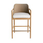 Bar stool with woven backrest and white cushion on a white background