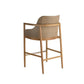 Bar stool with woven seat and wooden frame on a white background