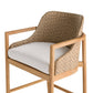 Chair with woven backrest and white cushion on a white background