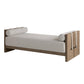 Wooden bed frame with white mattress and pillows on a white background