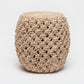 Beige woven stool on a white background