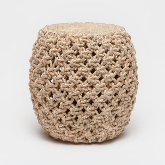 Beige woven stool on a white background