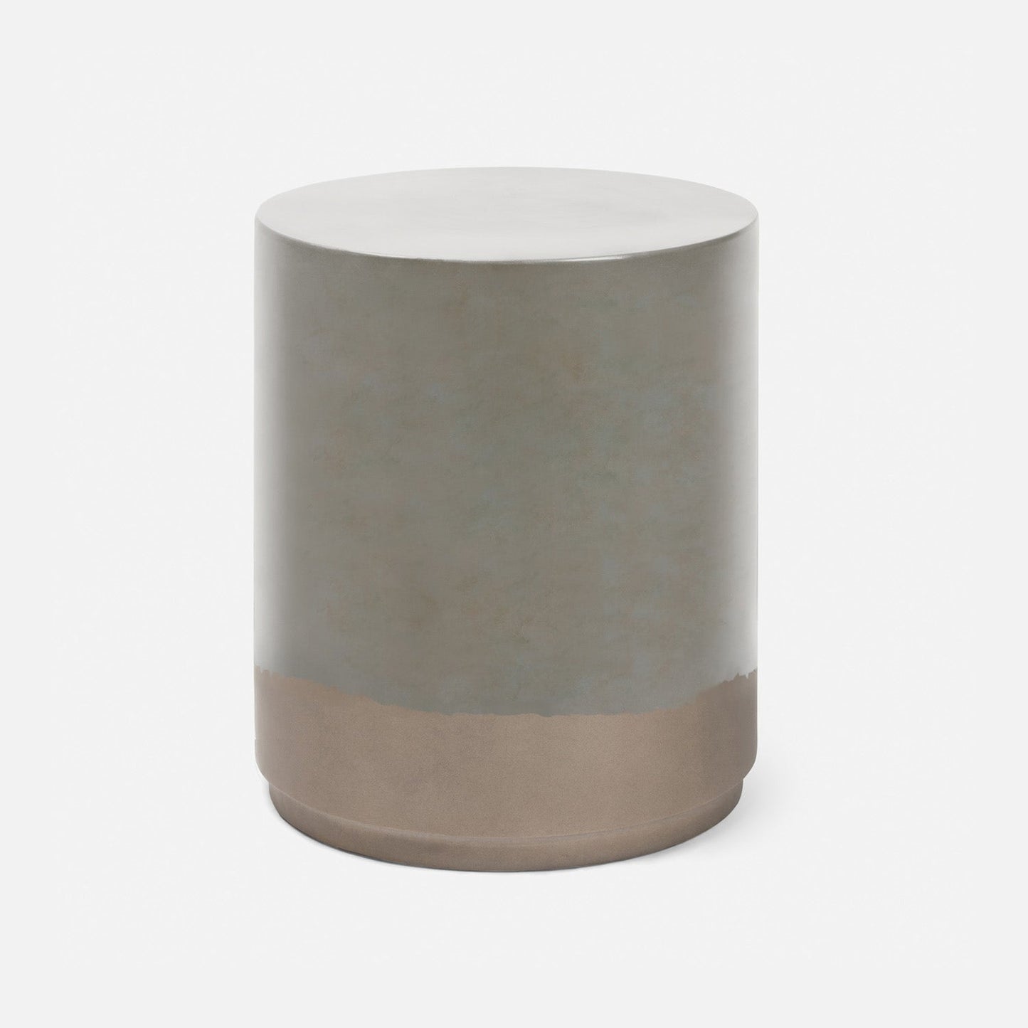 A modern cylindrical side table or stool with a matte metallic finish, featuring a silver-gray upper body and a warm bronze base, shown on a clean white background.