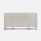 Light gray sideboard with gold handles on a white background