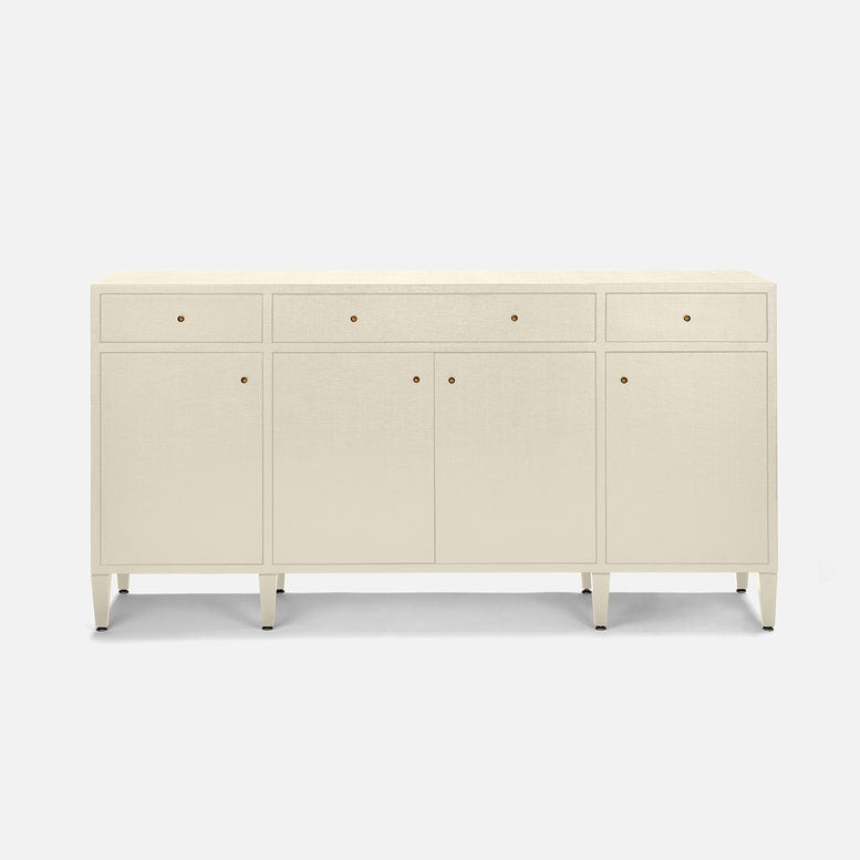 An off-white linen-textured sideboard with five drawers and doors, accented by small round brass knobs and supported by tapered legs, shown against a light gray background.