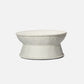 White textured coffee table on a light gray background