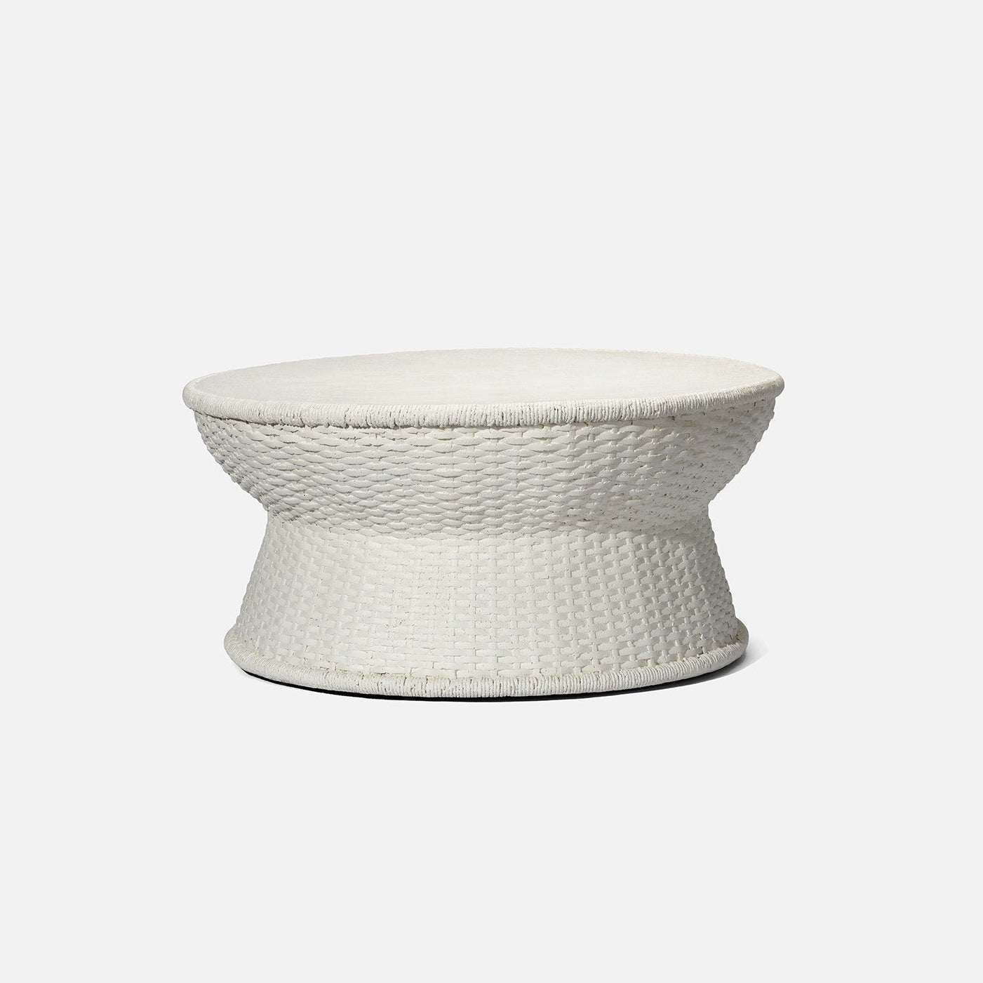 White textured coffee table on a light gray background