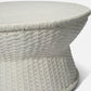 White textured coffee table on a light gray background