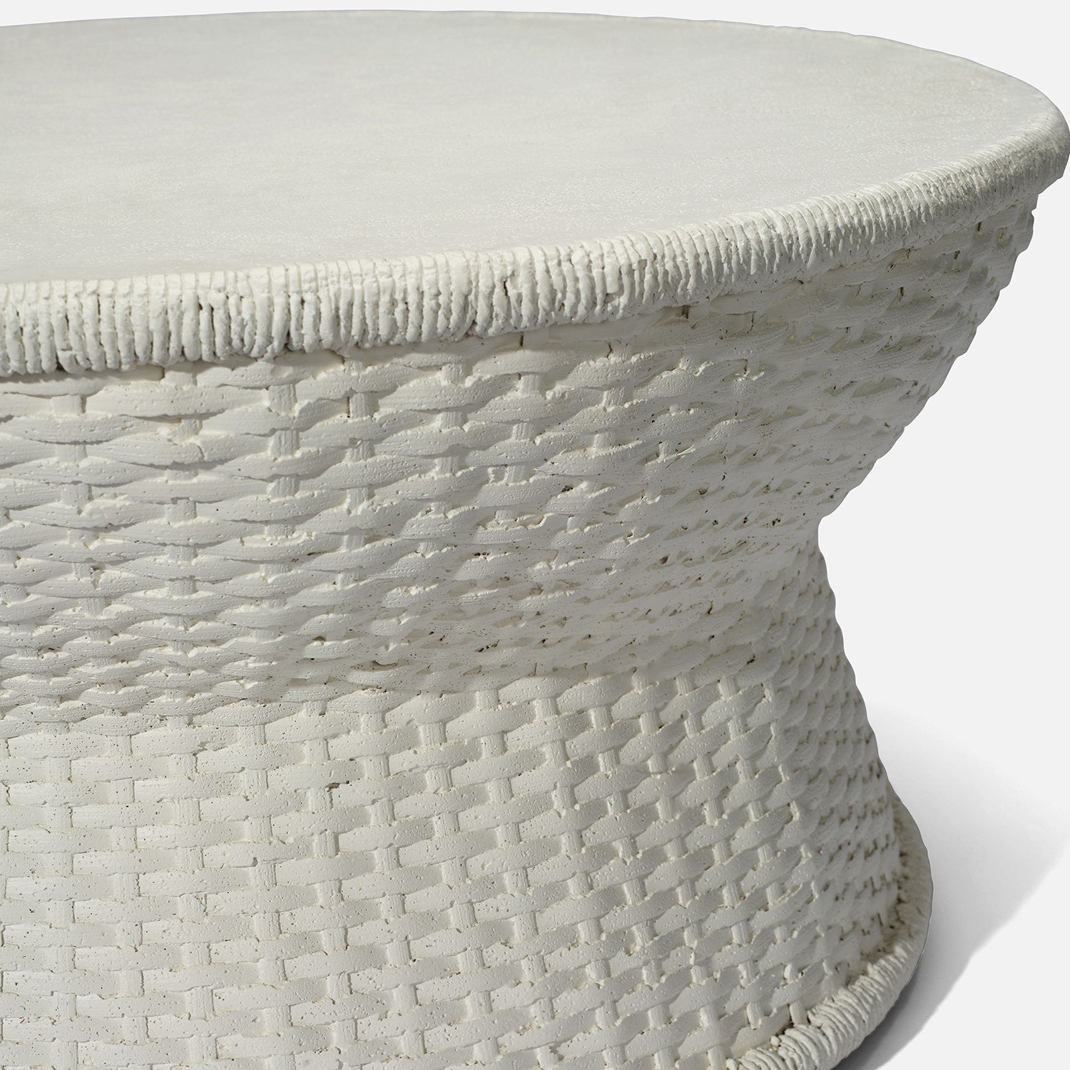 White textured coffee table on a light gray background