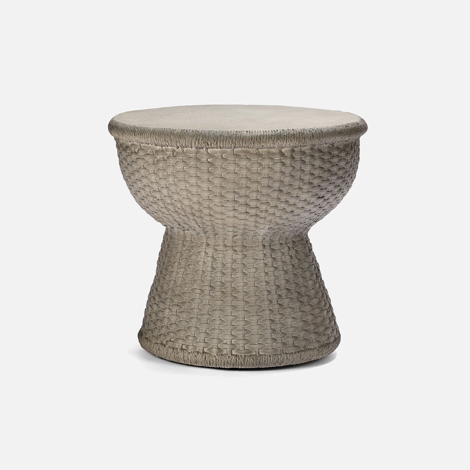 Woven side table with a beige cushion on a white background