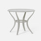Round glass table with metal frame on a white background
