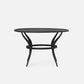 Black round table on a white background