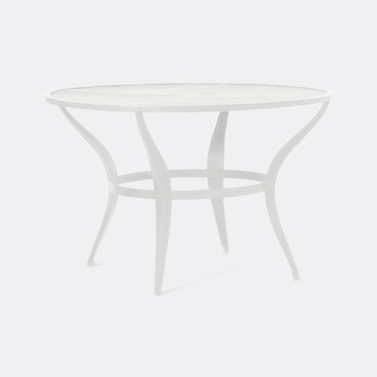 White round table on a light gray background