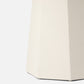Hexagonal white object on a light gray background