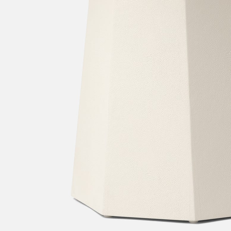Hexagonal white object on a light gray background