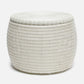 White woven coffee table on a light gray background