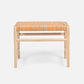 Woven stool with natural wood frame on a white background