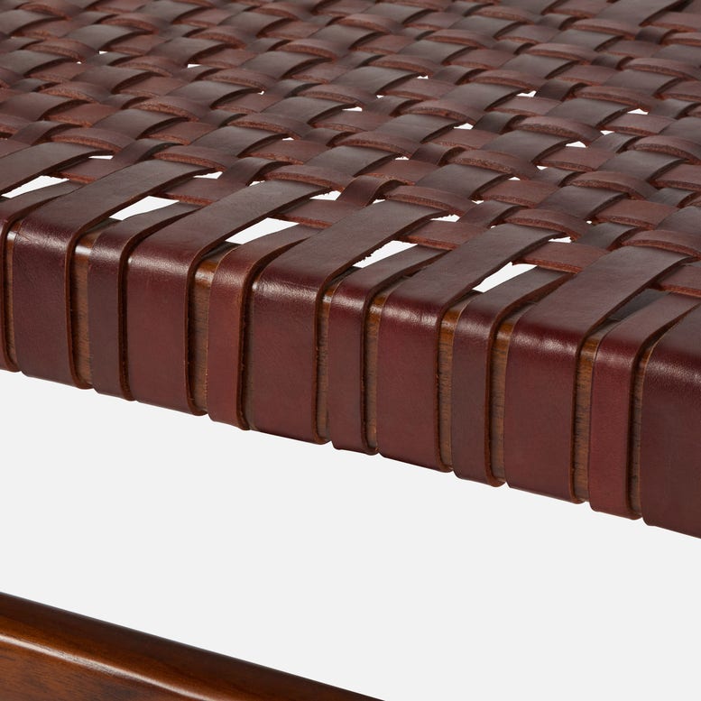 Close-up of a woven brown leather surface
