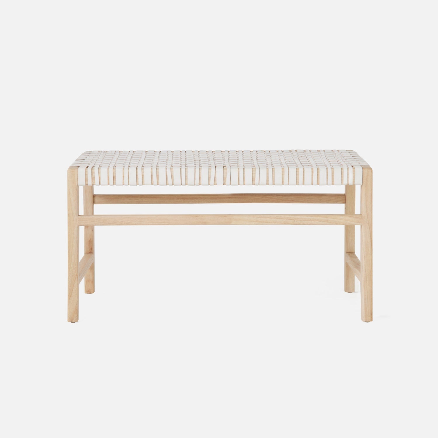 Wooden bench with woven seat on a white background