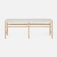 Wooden bench with a woven seat on a white background