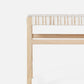 Wooden stool with woven seat on a white background