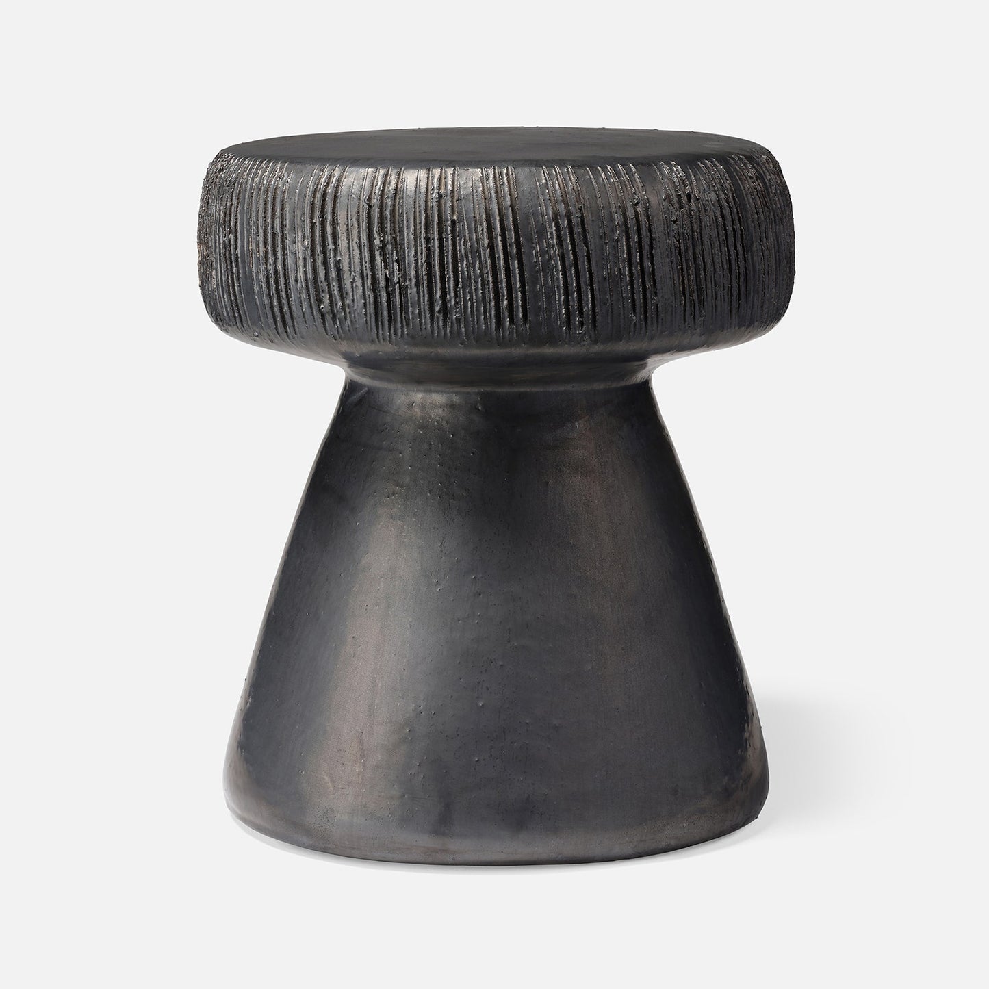 Black textured stool on a white background
