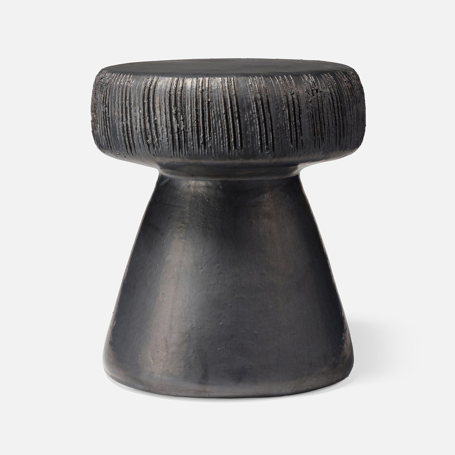 Black textured stool on a white background