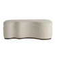Beige wavy ottoman on a white background