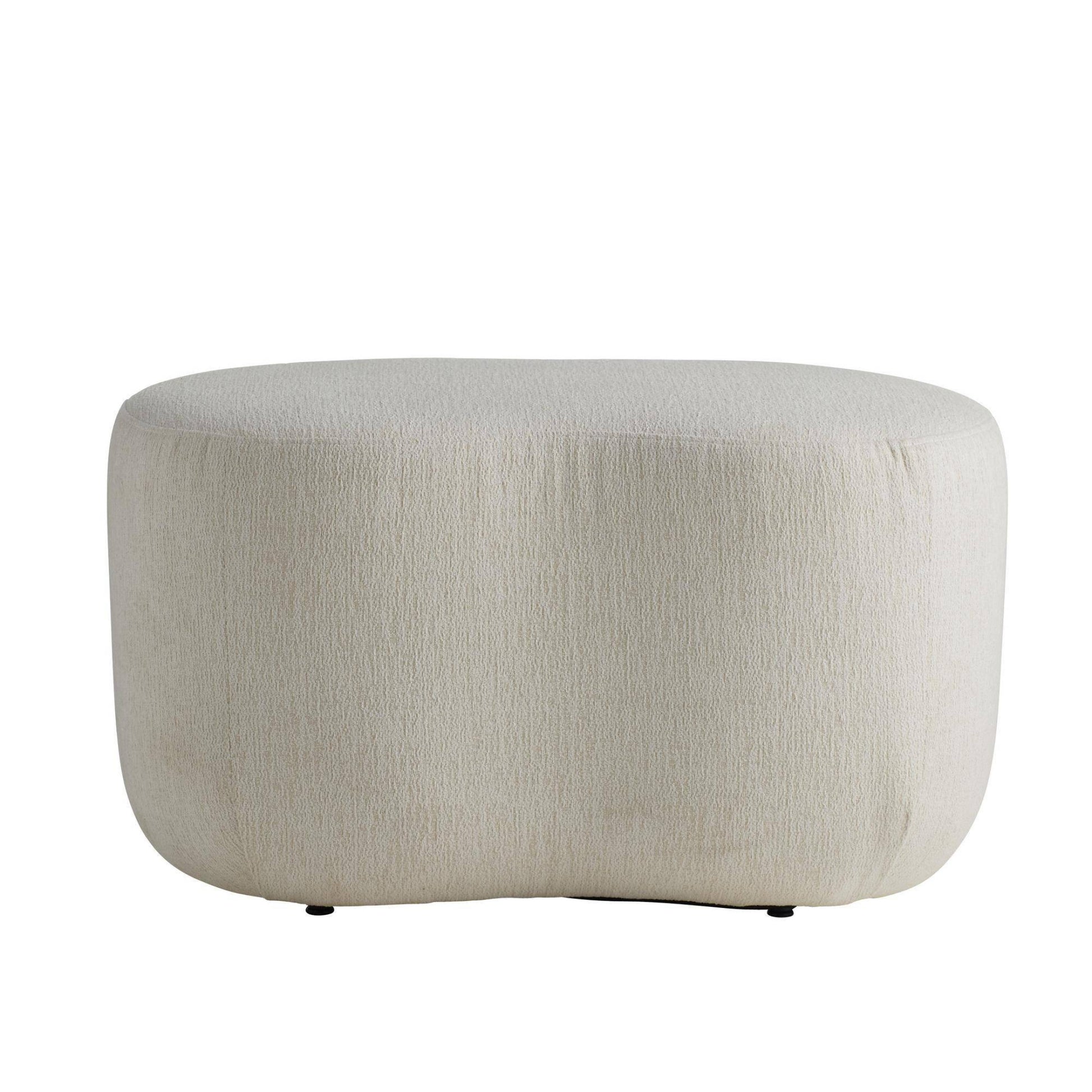 Round beige ottoman on a white background