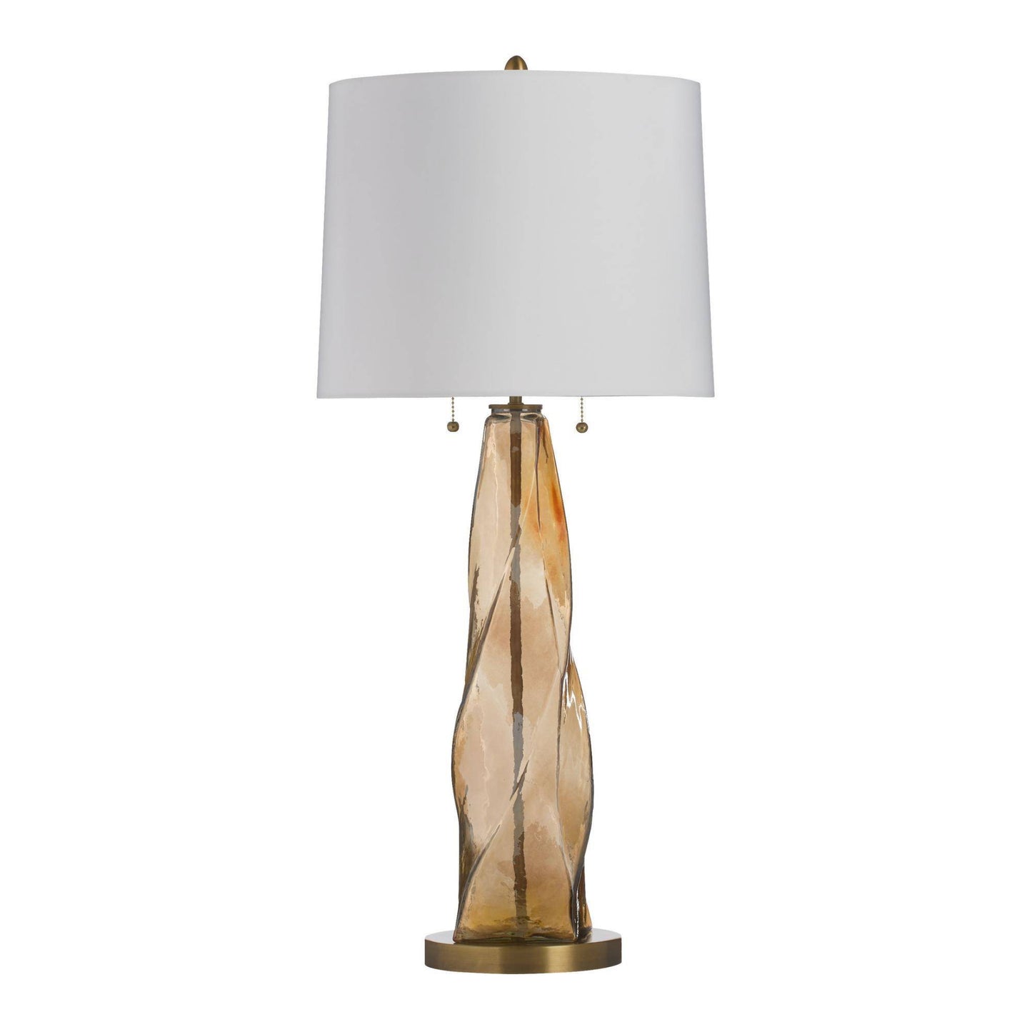 Table lamp with a brown glass base and white shade on a white background