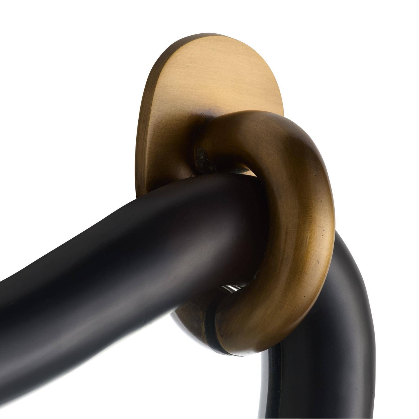 Close-up of a black and brass door handle on a white background