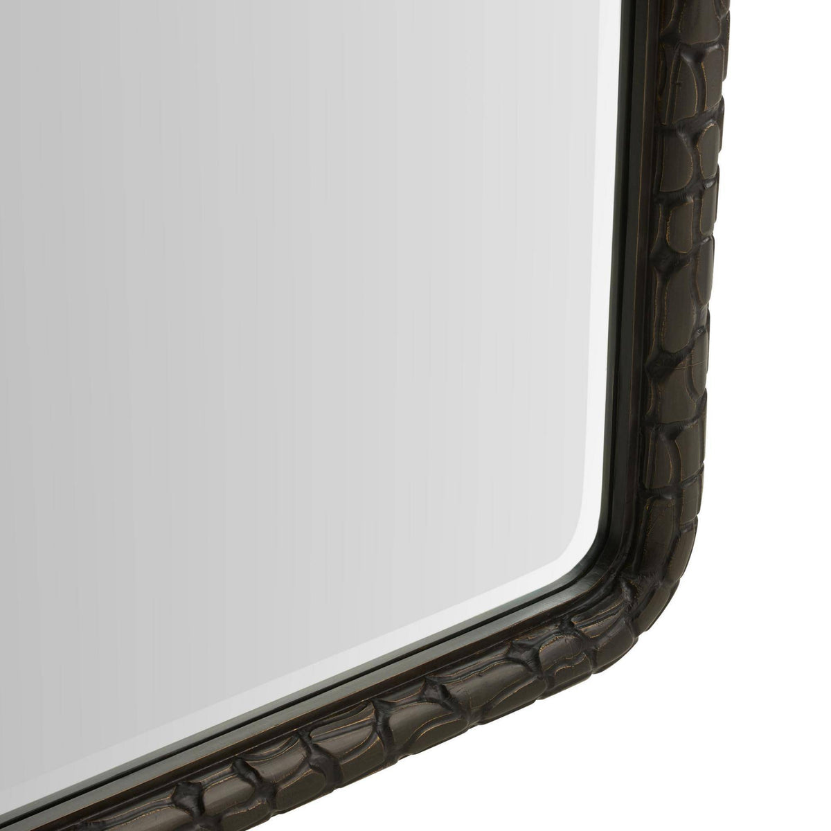 Rectangular mirror with a textured black frame on a white background
