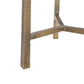 A modern accent table with a round white top and a textured, woven metallic gold base, shown against a plain white background.