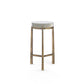 A modern accent table with a round white top and a textured, woven metallic gold base, shown against a plain white background.