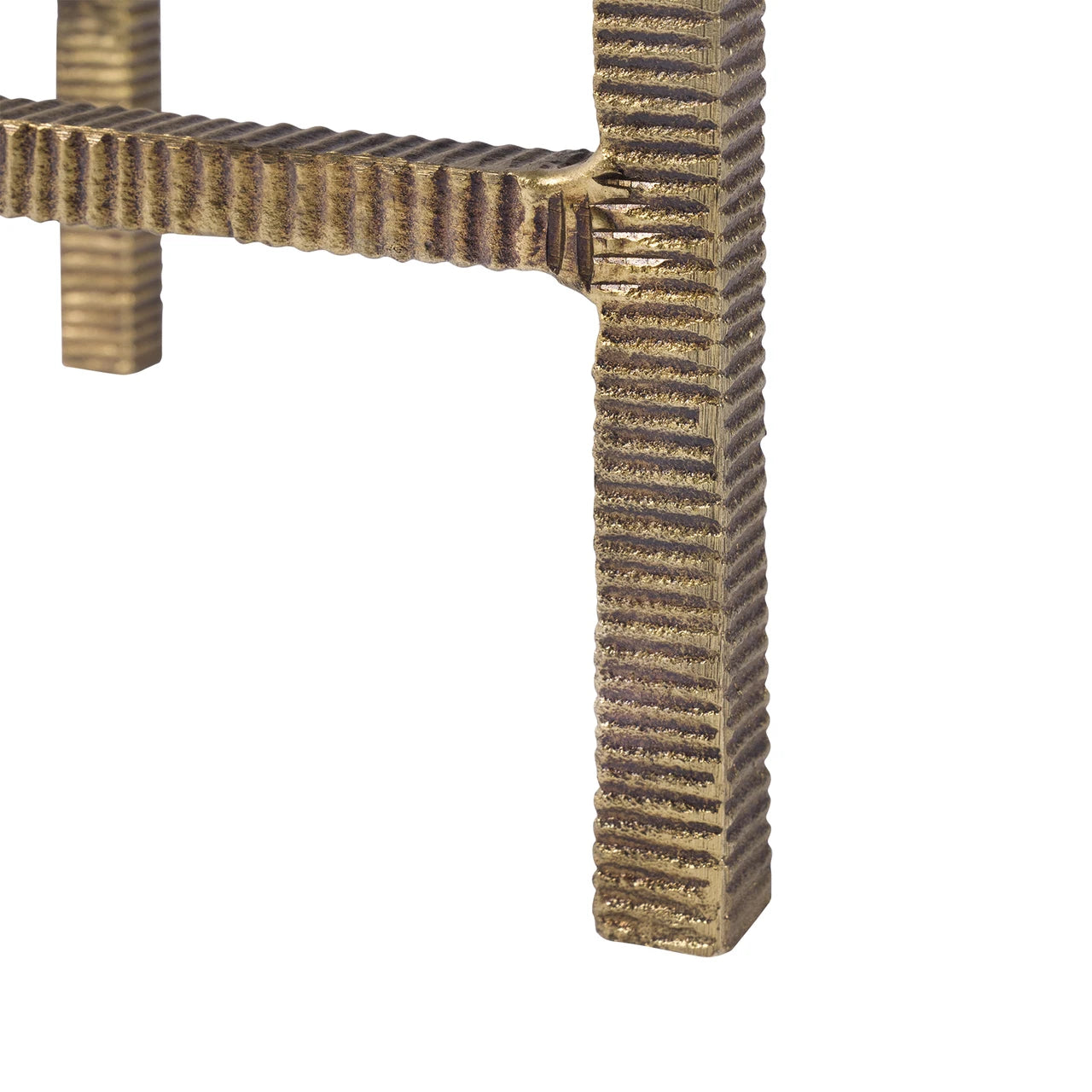 Close-up of a textured metal frame on a white background