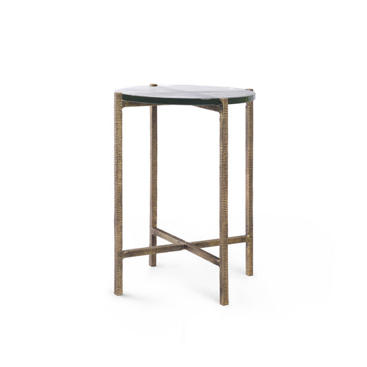 Accent table with metal frame and glass top on a white background