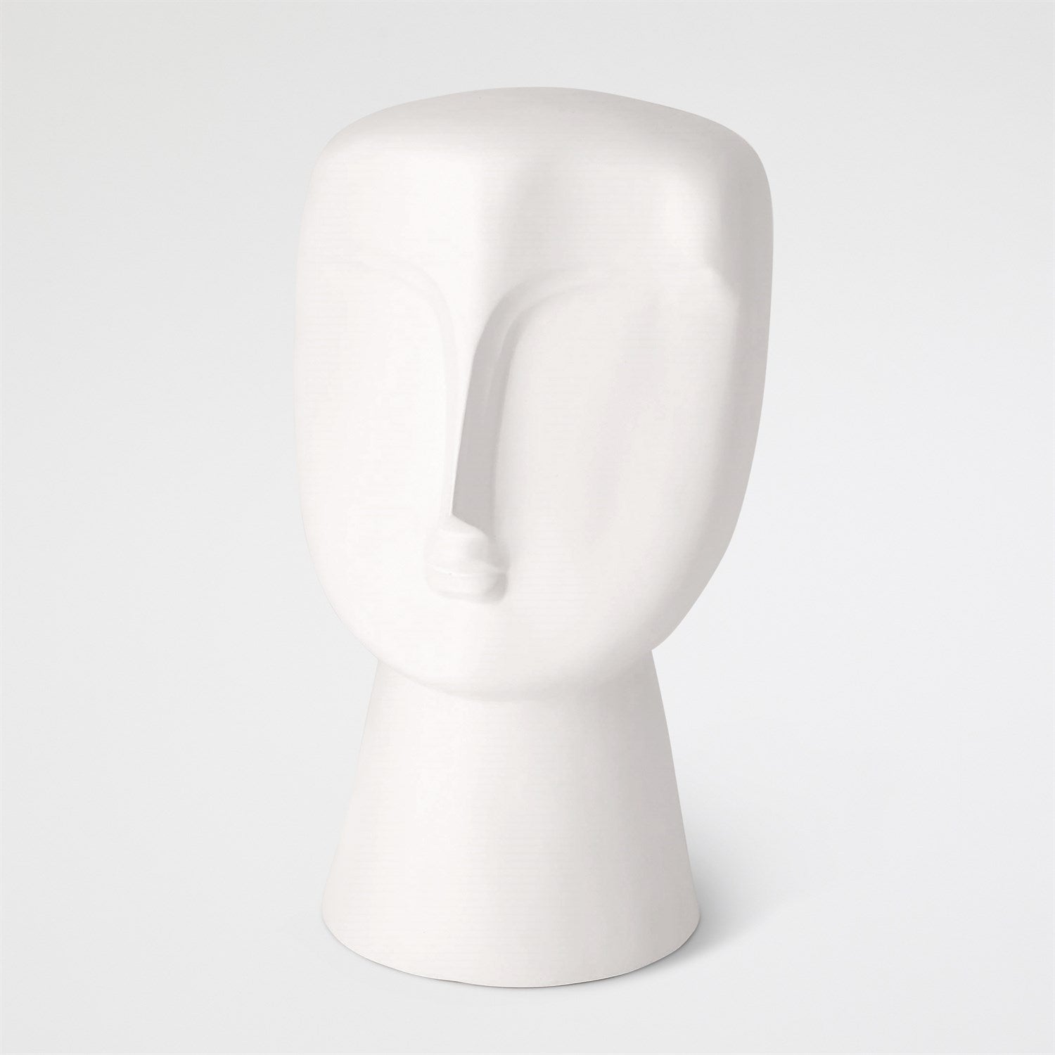 White mannequin head on a white background