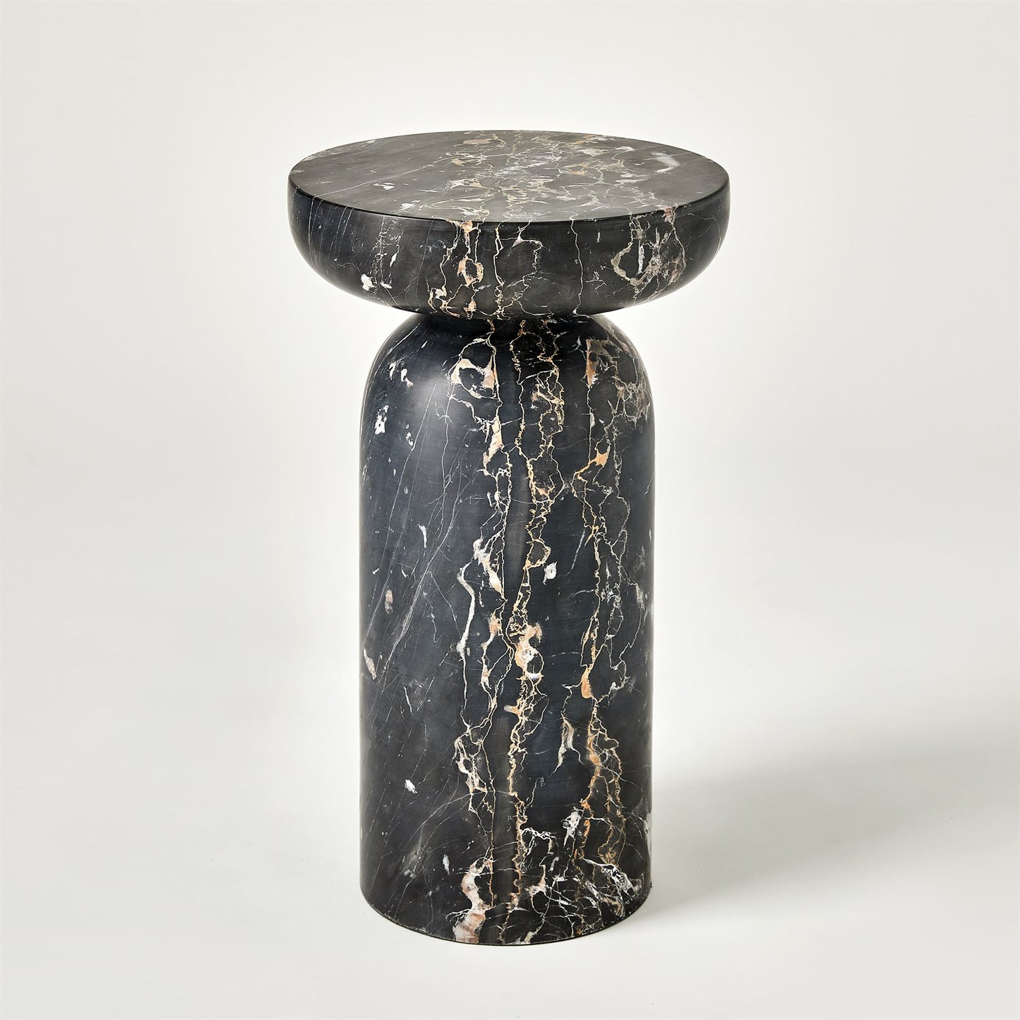 Marble side table with a black and gold pattern on a white background