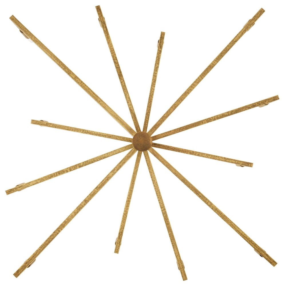 Decorative wall art with gold starburst design on a white background
