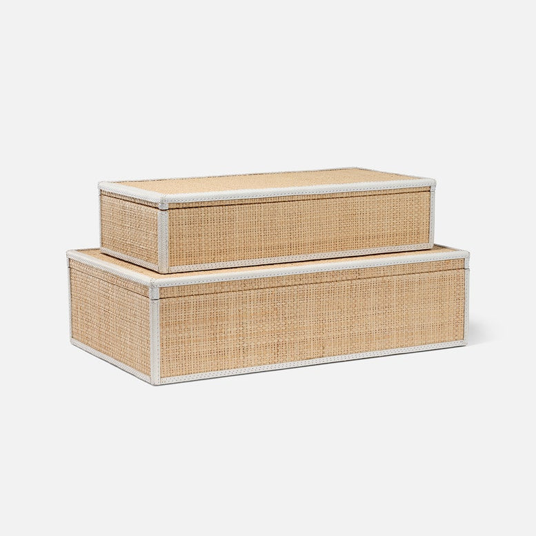 Two woven storage boxes with white frames on a light gray background