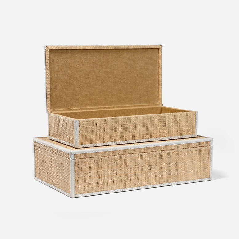 Set of two woven storage boxes on a white background