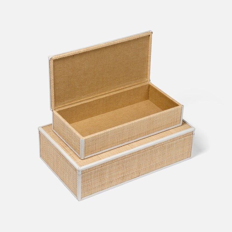 Set of two woven storage boxes with lids on a white background